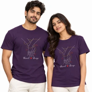 Indian couple wearing matching deep purple T-shirts with minimalist holding hands line art, small red hearts, and Bharat and Shruya names.
