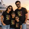 Family of four wearing matching black Family Cruise 2025 T-shirts with cruise ship, palm trees and nautical design