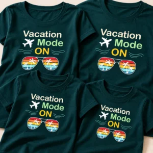 Close-up of four dark teal family vacation T-shirts showing the “Vacation Mode ON” airplane and tropical sunglasses design.