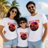 Family wearing matching white Beach Vibes vacation T-shirts with sunset, palm tree and tropical beach graphic