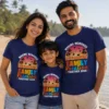 Parents and child wearing matching navy blue Making Memories Family Vacation Together 2025 T-shirts at the beach