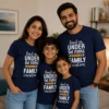 Family of four wearing personalized navy blue Sharma Family Vacation T-shirts with Find Us Under the Palms design