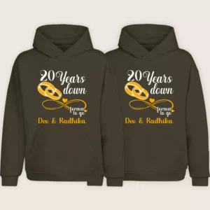 Matching 20th anniversary couple hoodies with gold ring design and personalized names Dev and Radhika