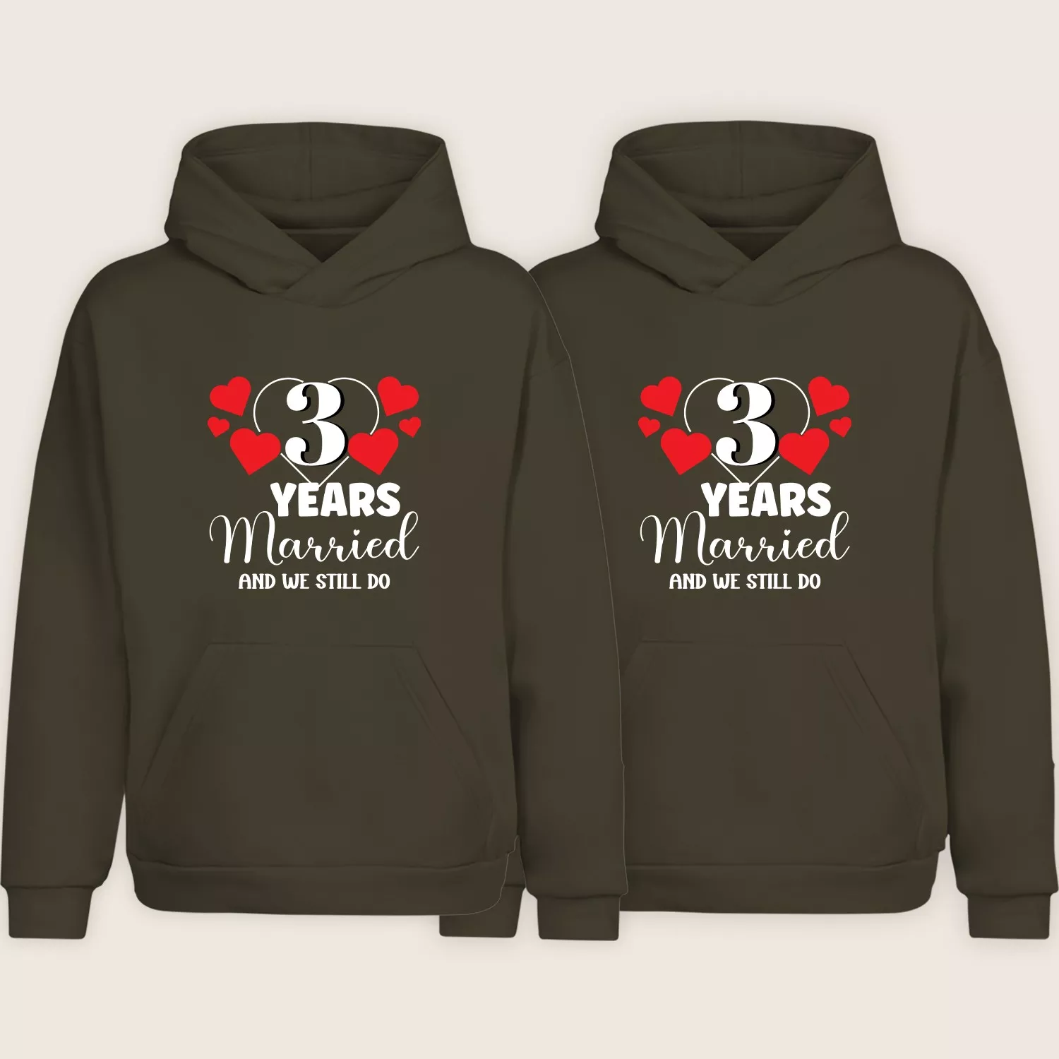 Matching 3rd anniversary couple hoodies in brown with “3 Years Married and We Still Do” printed design