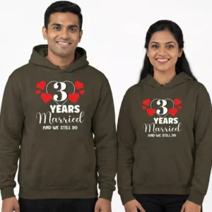 Personalized 3rd anniversary couple hoodies with “3 years married and we still do” design in matching brown hoodies