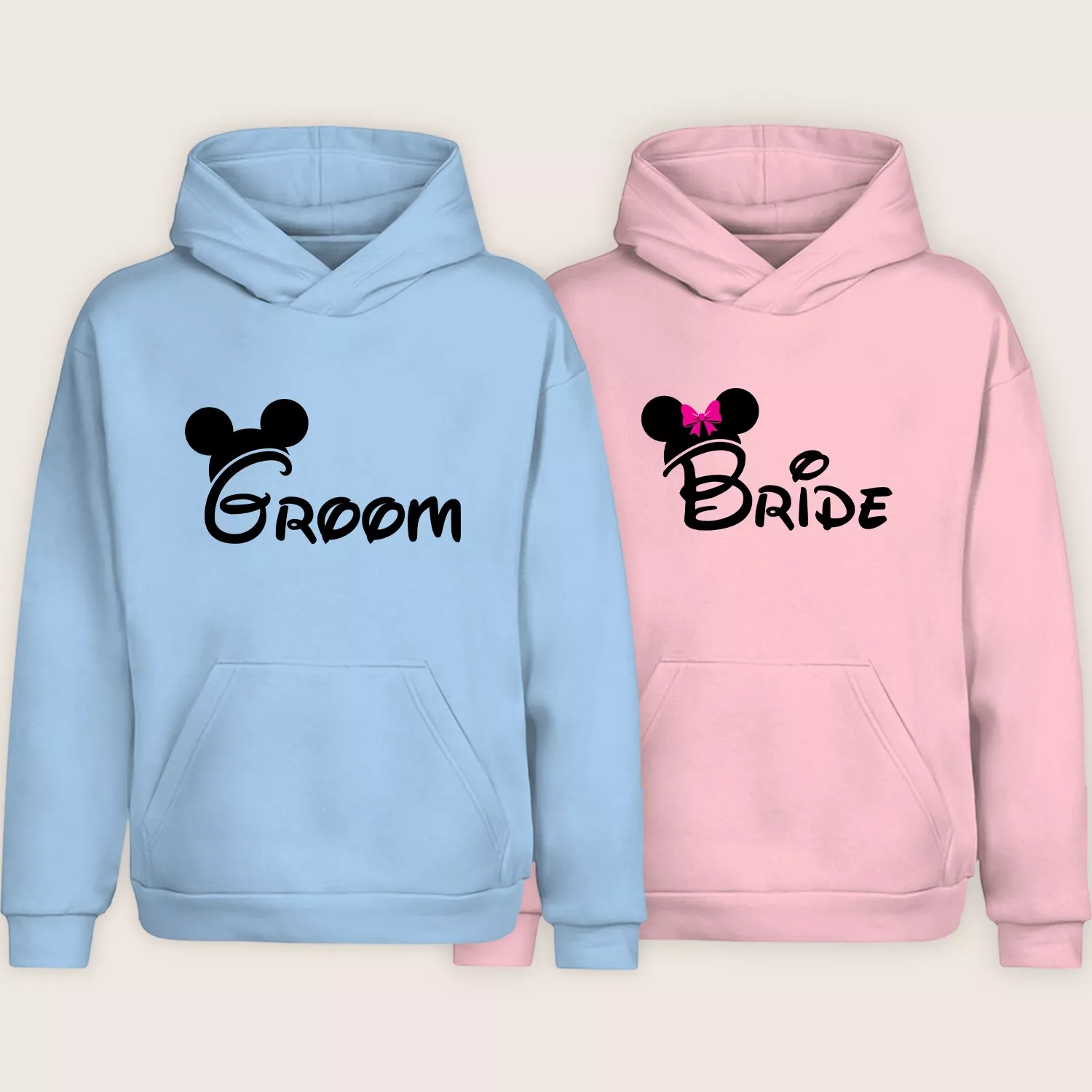 Matching Bride and Groom hoodies in pink and blue with cute printed design