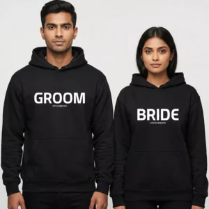 Bride and groom matching black hoodies with custom date printed for pre-wedding photoshoot.