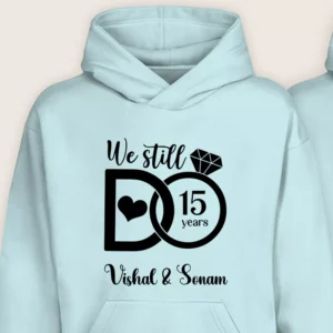 Close-up of personalized 15th anniversary hoodie with “We Still Do 15 Years” design and custom names.