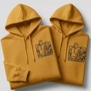 Matching couple hoodies with personalized line-art photo embroidery in mustard yellow