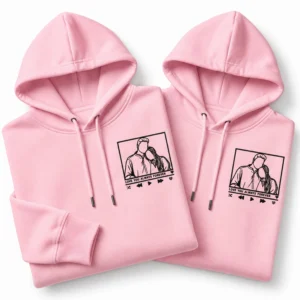 Baby pink personalized couple hoodies with embroidered line art portrait and love message