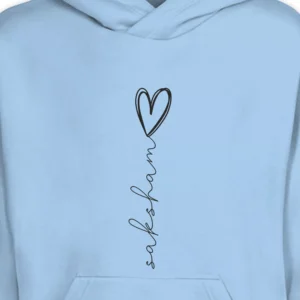 Close-up view of personalized couple hoodie with custom printed name and heart design in sky blue color