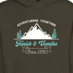 Close-up view of custom script name couple hoodie design featuring mountain adventure graphic and personalized names print.