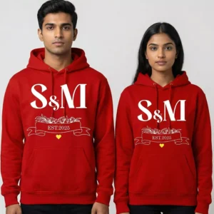 Elegant initials printed couple hoodies in red with custom S & M design and EST.2025 banner