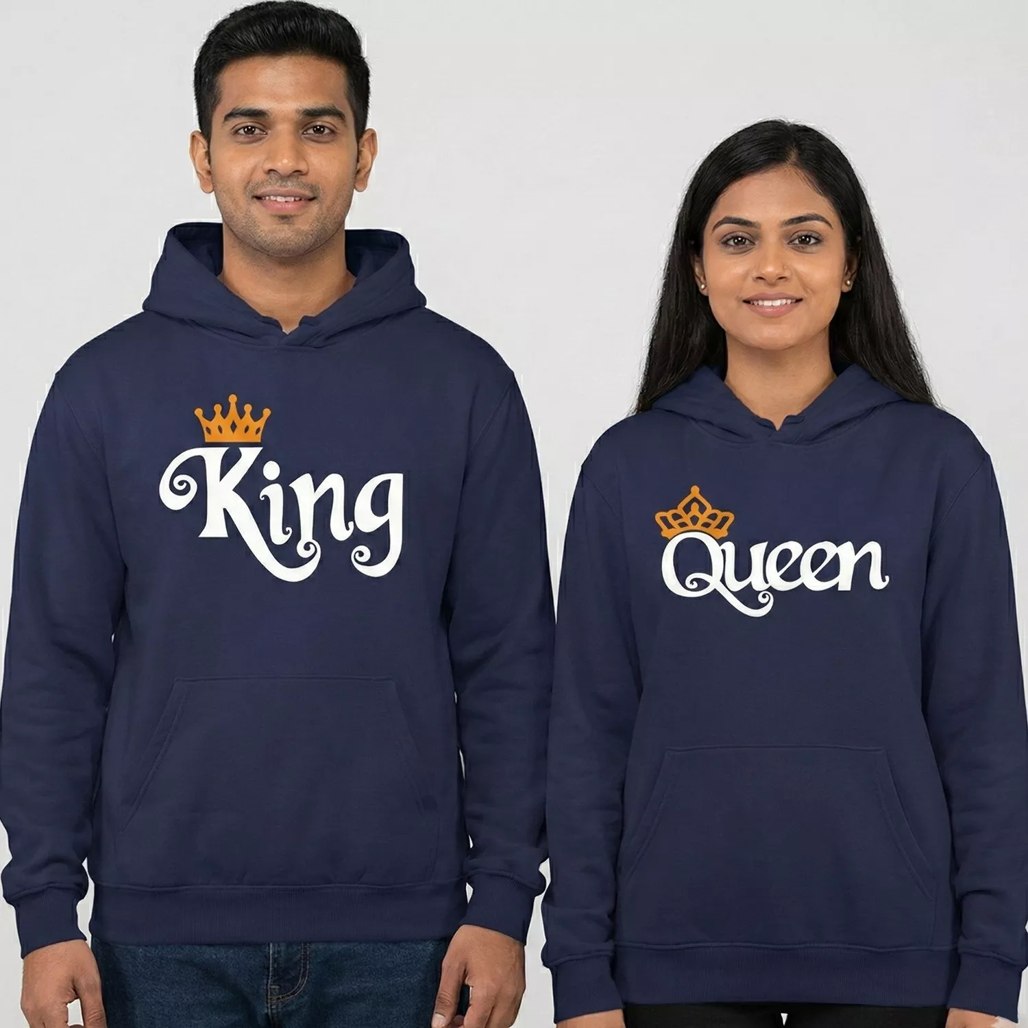 King and Queen matching couple hoodies in navy blue worn by a man and woman