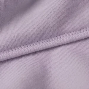Close-up texture and stitching of lavender hoodie fabric used for personalized hoodies