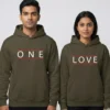 Matching couple hoodies set with “One Love” minimal typography design in olive green