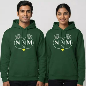 Couple wearing matching green Initial Letter Personalized Couple Hoodies with custom initial letters and lotus design