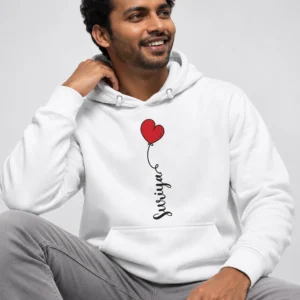 Man wearing a white personalized couple hoodie with a red heart balloon and vertical custom name print on the chest.