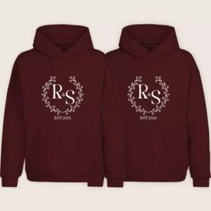 Maroon personalized couple hoodies with monogram initials R and S and EST 2025 print