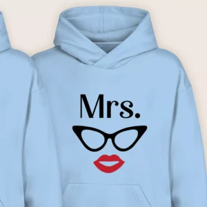Close-up of Mrs hoodie in light blue with cartoon cat-eye glasses and red lips design