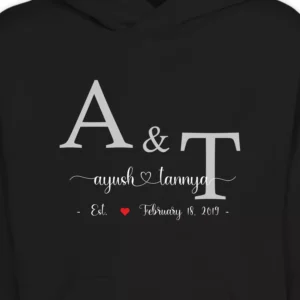 Close-up of custom couple hoodie with personalized initials names and anniversary date printed on black hoodie