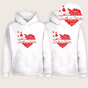 White matching couple hoodies with red heart design and personalized name print, displayed as a pair.