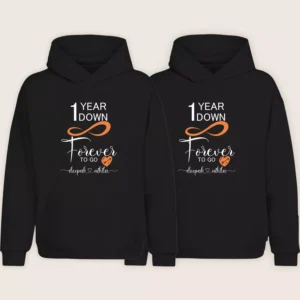 Black personalized 1st anniversary couple hoodies with “1 Year Down Forever to Go” printed design and custom names