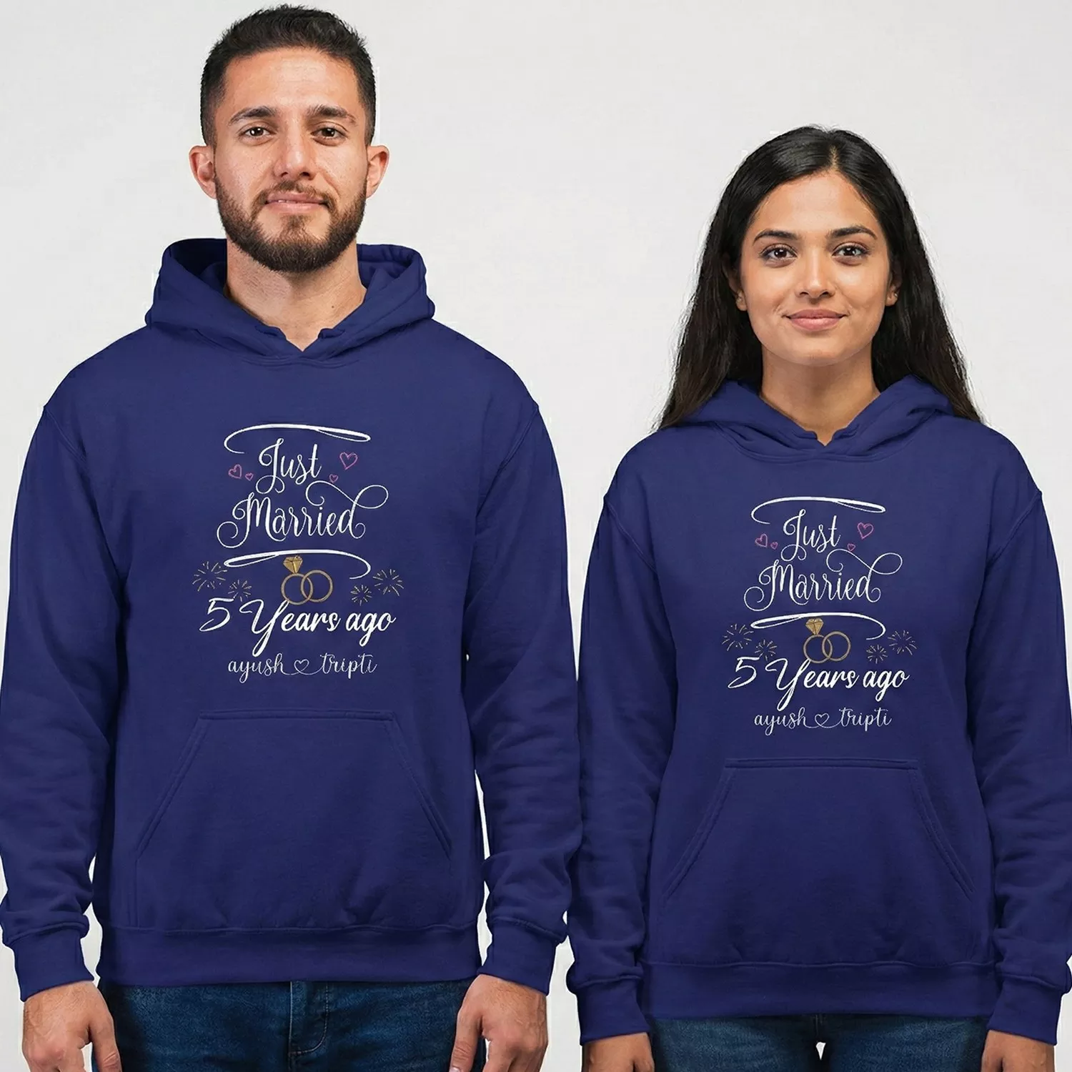 Couple wearing personalized 5th anniversary couple hoodies with “Just Married 5 Years Ago” custom design in navy blue.