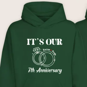 Close-up of personalized 7th anniversary hoodie with custom names and ring design