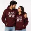 Couple wearing matching burgundy personalized anniversary hoodies with “Just Married 09 Years Ago” design and custom names print.