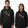 Personalized couple hoodies with custom initials H and M printed on black matching hoodie set
