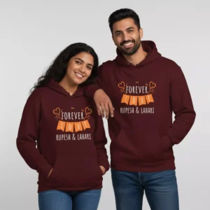 Couple wearing personalized couple hoodies name print in maroon, matching custom sweatshirt set for couples