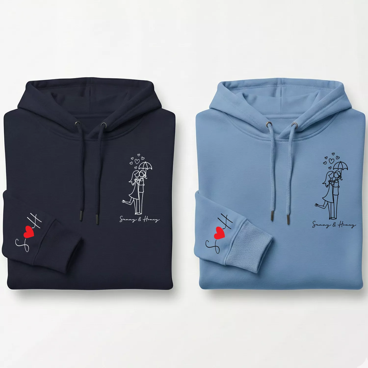 Personalized couple hoodies with names and sleeve initials featuring romantic line-art design.