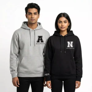 Couple wearing personalized hoodies with roman date and varsity initials in grey and black