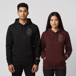 Couple wearing personalized hoodies in black and maroon with line-art design, custom names, and sleeve initials