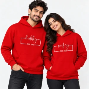 Personalized matching couple hoodies in bright red with white Hubby and Wifey EST. 2025 chest designs.