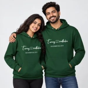 Green personalized name couple hoodies with Tanay and Vedhika names, heart detail, and December 08 2019 date.