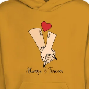 Close-up of personalized name design couple hoodie featuring hand-holding illustration with custom names and a red heart