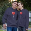 Personalized name hoodie set for couples featuring matching heart design hoodies with names printed and “Est. 2025” text