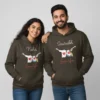 A smiling Indian couple wearing personalized name hoodies for couples with heart designs, showcasing custom couple hoodie set.
