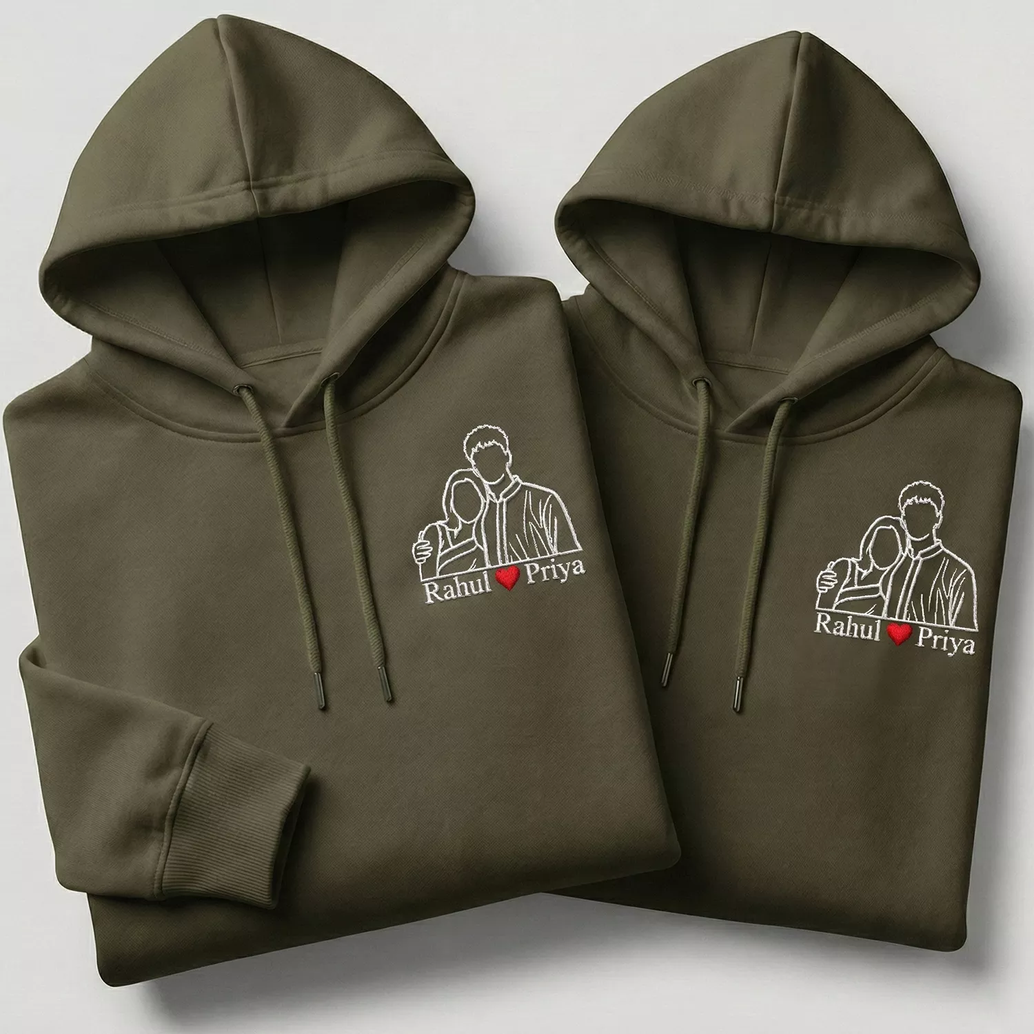 Personalized photo to line art couple hoodies with custom photo-to-line-art embroidery and names on olive green hoodies