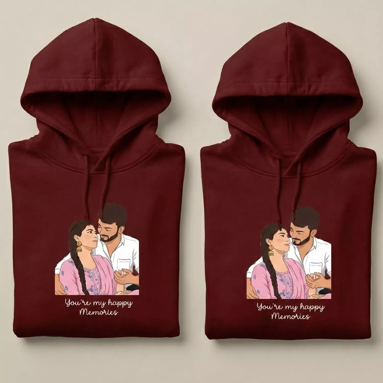 Folded maroon couple hoodies with personalized photo to vector art illustration for anniversary gifting