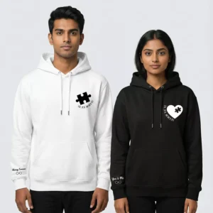 Couple wearing personalized puzzle hoodies with Roman date and sleeve text print