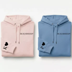 Minimal roman date couple hoodies in pink and blue with heart sleeve initials
