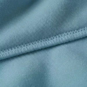 Close-up view of baby blue hoodie fabric and stitching used for personalized hoodies