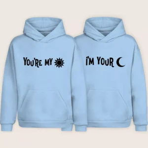 Light blue matching couple hoodies with “You’re My” sun design and “I’m Your” moon design displayed side by side.