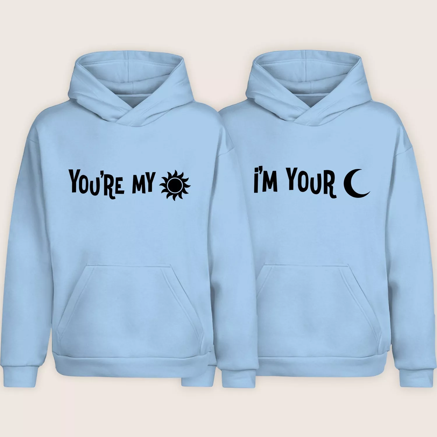 Light blue matching couple hoodies with “You’re My” sun design and “I’m Your” moon design displayed side by side.
