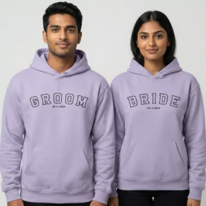 Bride and Groom wearing matching lavender hoodies with custom printed wedding date