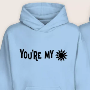 Light blue couple hoodie with “You’re My” text and sun symbol printed in black