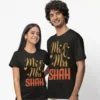 Newly married couple wearing personalized Mr and Mrs surname matching black T-shirts for wedding gift